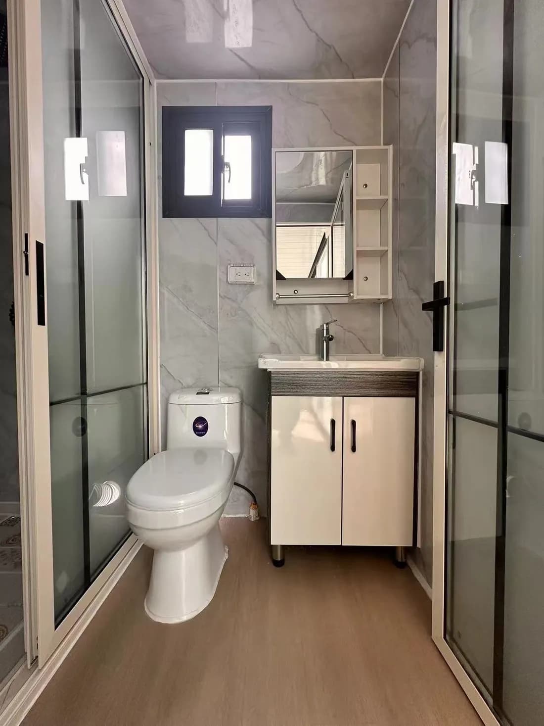 An example Ready 20 fit-out with a shower, toilet and vanity