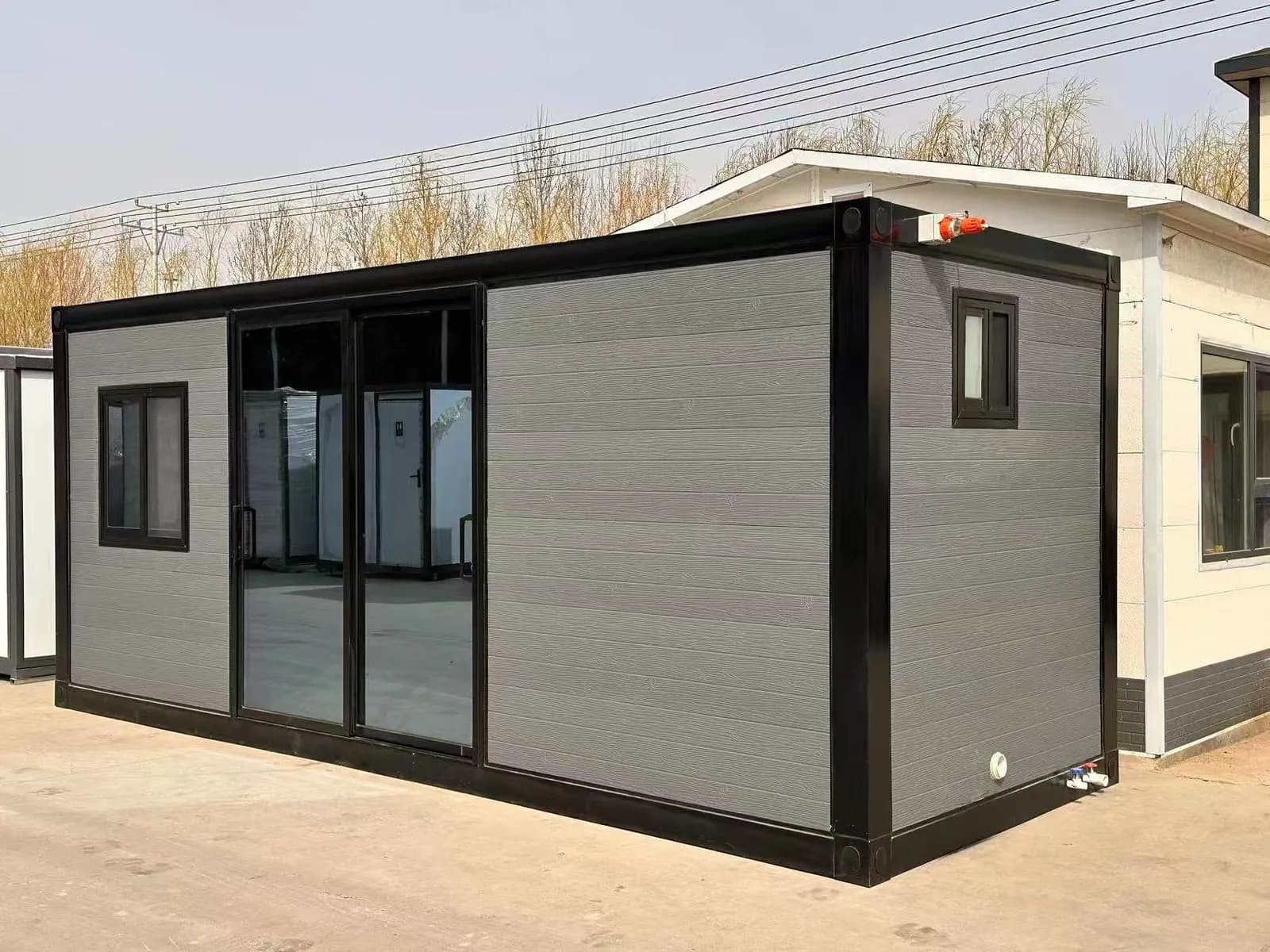 Ready 20 from the front, with a sliding glass door and a side window